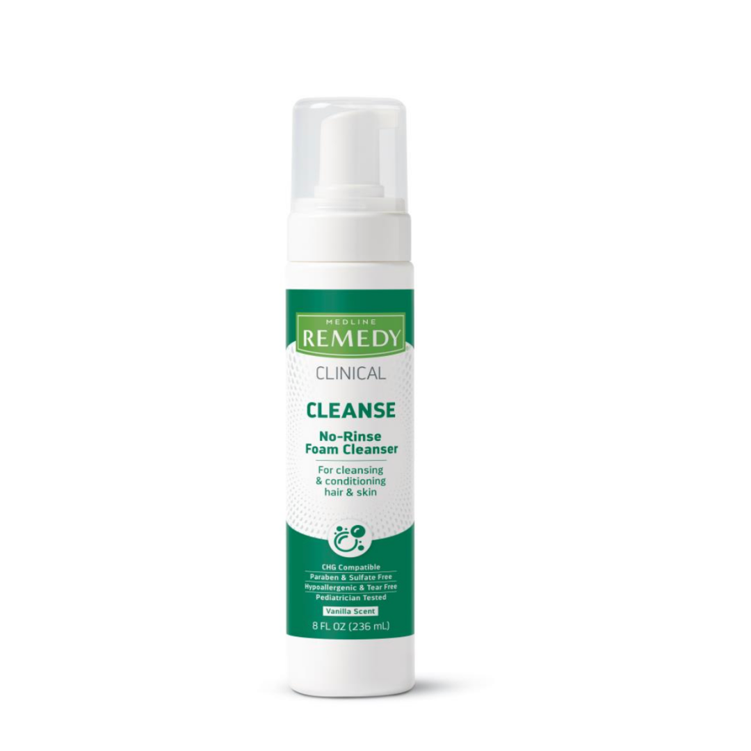 A white 8 fl oz Medline Remedy Clinical No-Rinse Foam Cleanser - Body Wash & Shampoo bottle with a green label and foaming pump features a hypoallergenic no-rinse formula to gently cleanse and condition hair and skin.